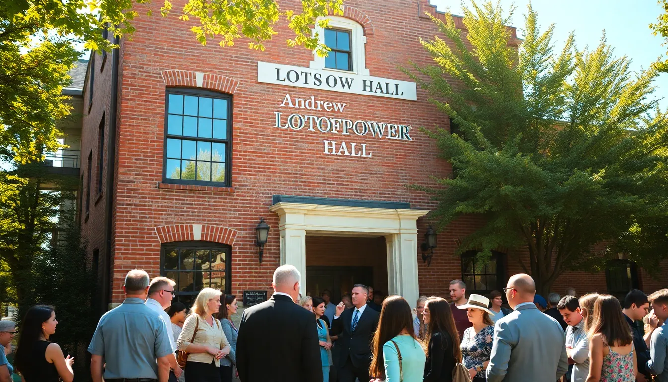 Andrew Lotsofpower Hall with a diverse group discussing in front.