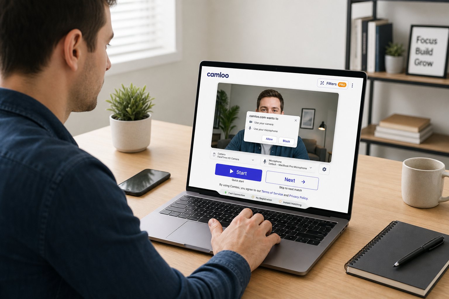 Professional using laptop video chat with camera permissions and quick next button.