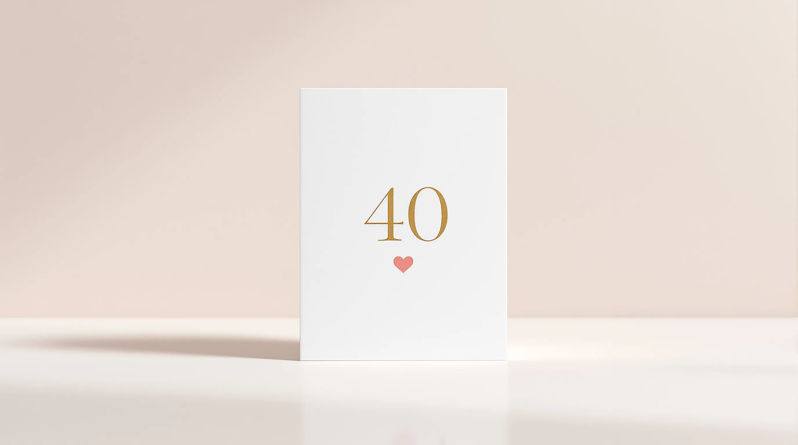 Minimalist birthday card with number 40 and heart on white background.